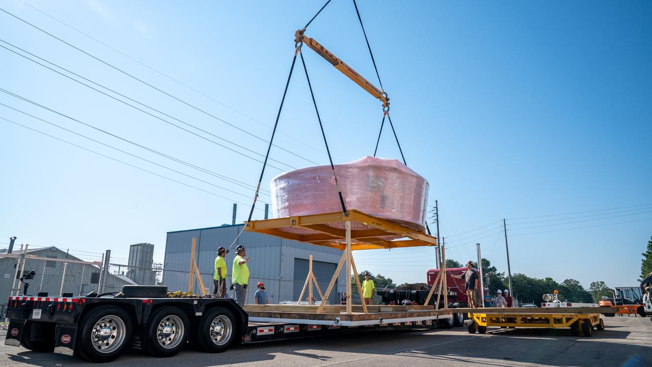 These images show the Orion stage adapter for Artemis II being prepped for shipment and then packaged in a large box, loaded on a semi-truck. It is seen leaving NASA’s Marshall Space Flight Center in Huntsville, Alabama, as it begins its journey to NASA’s Kennedy Space Center in Florida. Manufactured at Marshall, this adapter for the SLS (Space Launch System) connects the rocket’s interim cryogenic propulsion stage to the Orion spacecraft and is the final piece of SLS hardware to be delivered to Kennedy Space Center in preparation for the Artemis II mission.